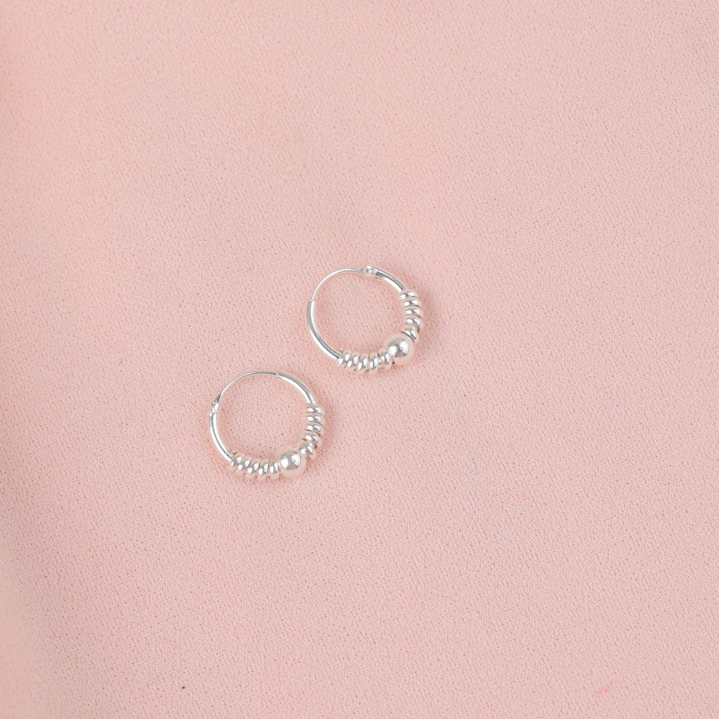 Arete piercing esfera con donas - Plata