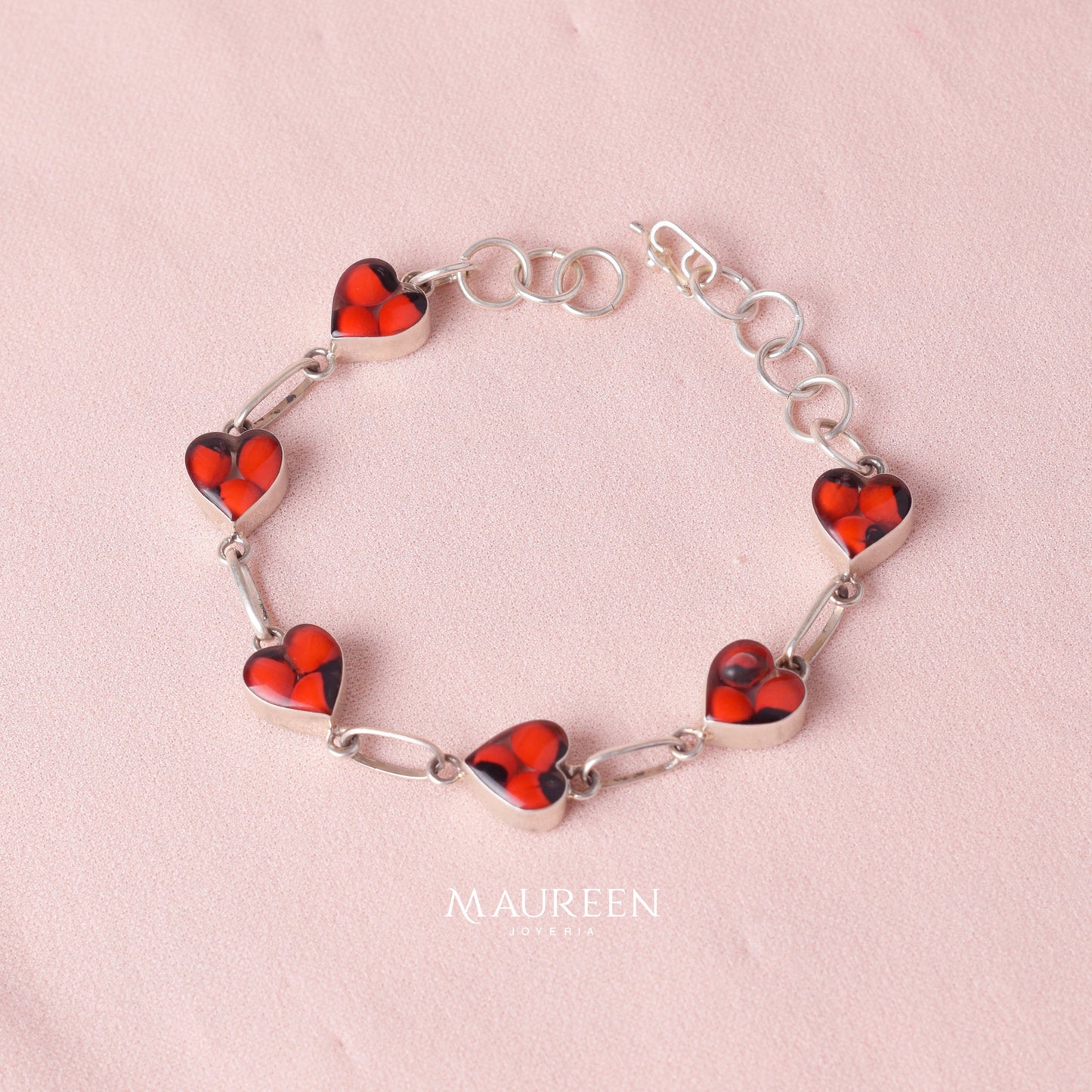 Pulsera corazones de huayruro  - Plata