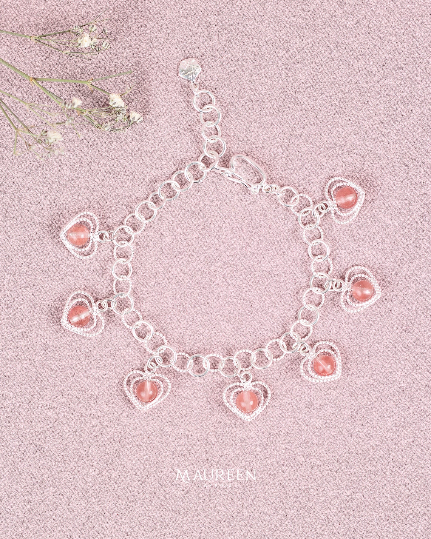 Pulsera corazones con piedras naturales - plata