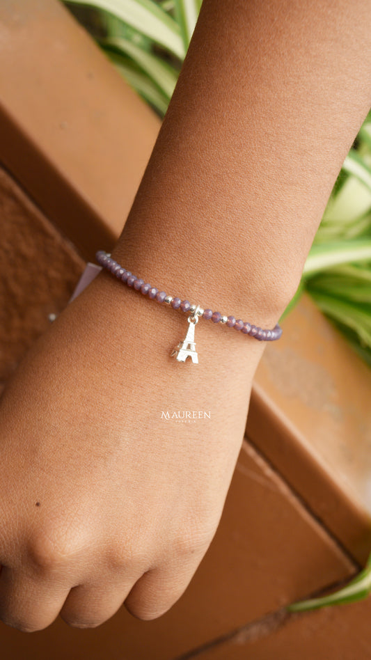 Pulsera de hilo con murano morado con dije de torre eiffel - Plata