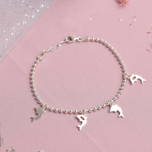 Pulsera esfera con dijes delfin - Plata