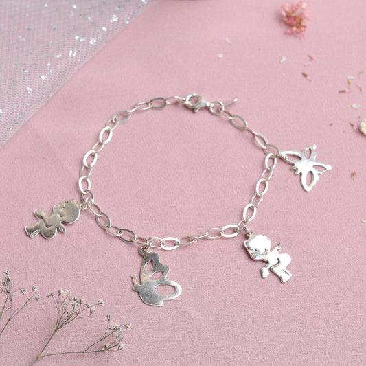 Pulsera con dijes cupido- Plata