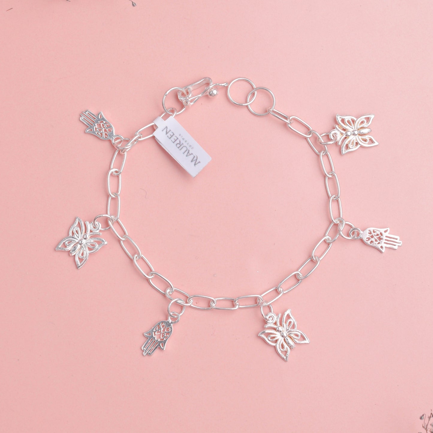 Pulsera dijes mariposa con mano poderosa - Plata