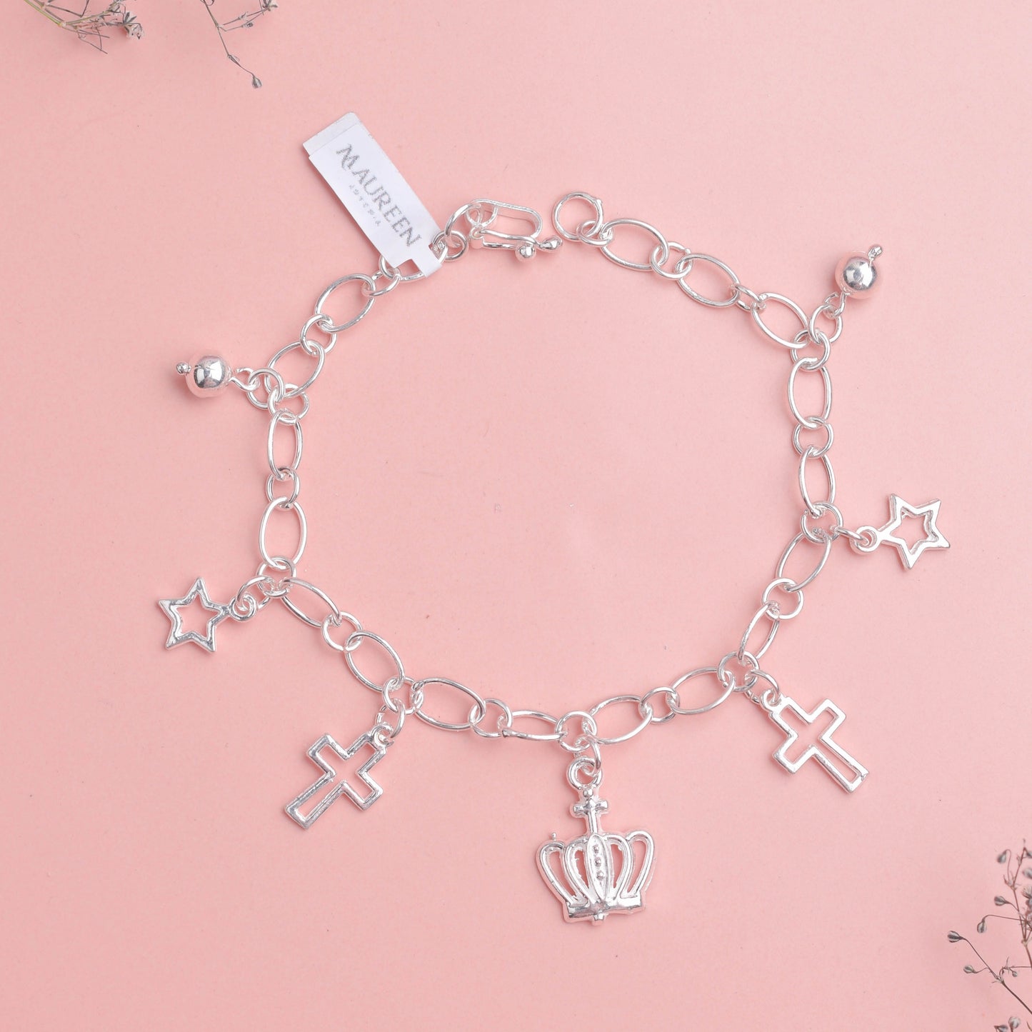 Pulsera dijes corona, cruz y estrella - Plata